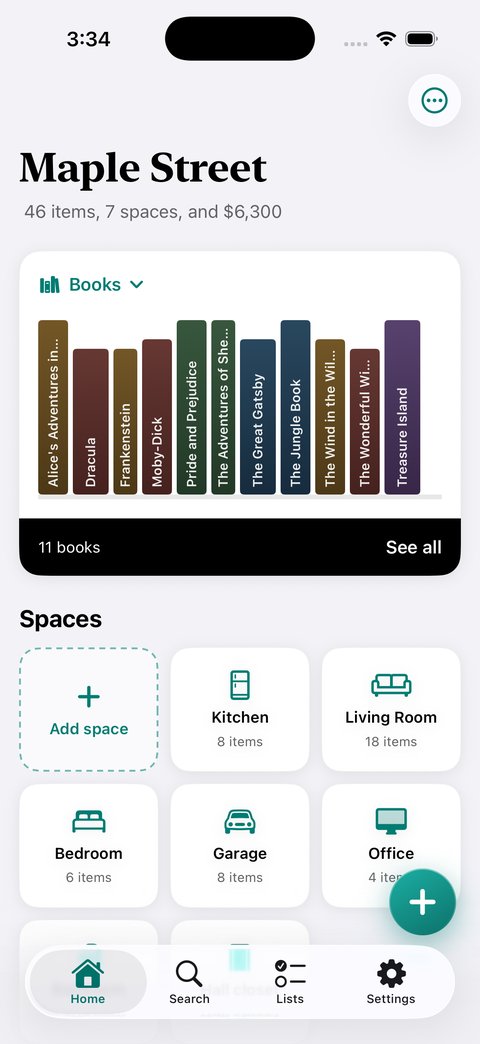 1.0 Home at the default size: Maple Street, the Books card as a shelf of spines, then Spaces.